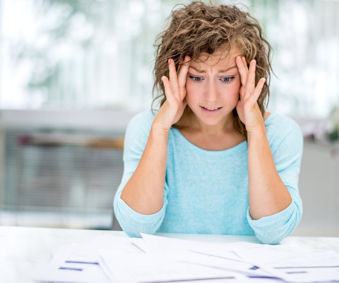 Frustrated woman working at home