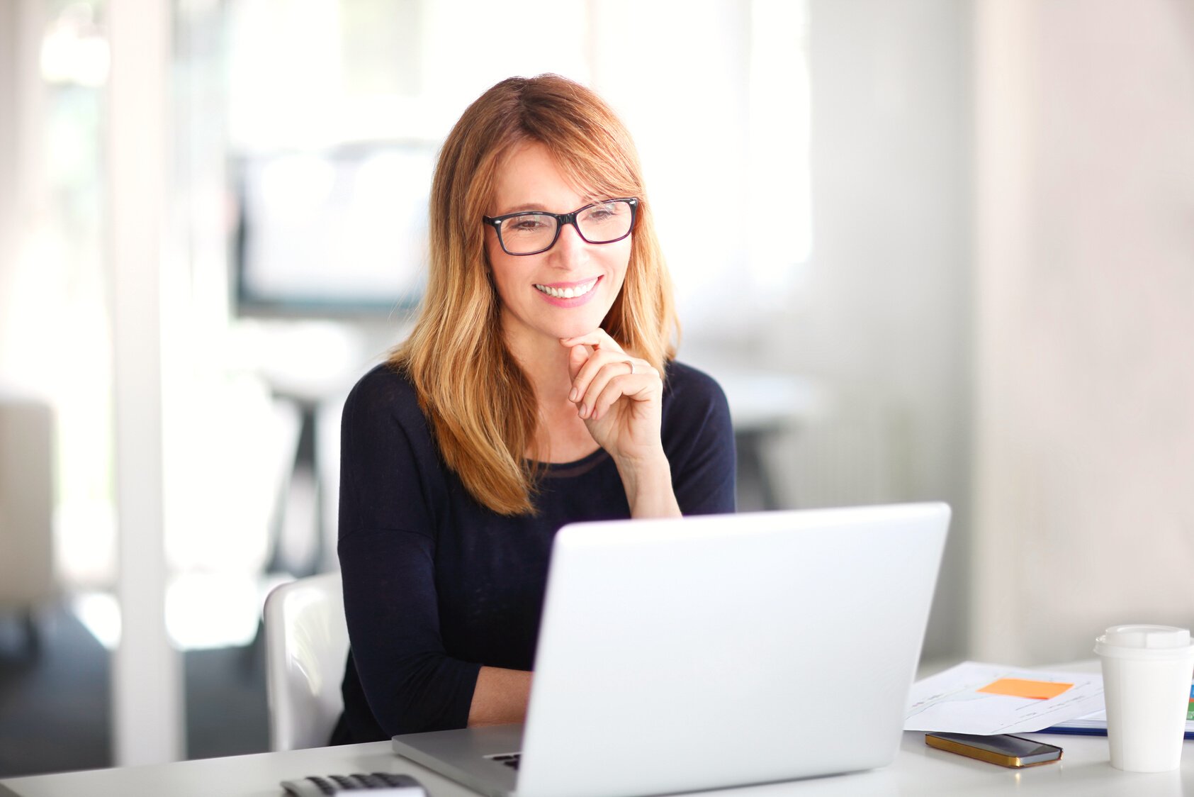 Professional woman working on laptop