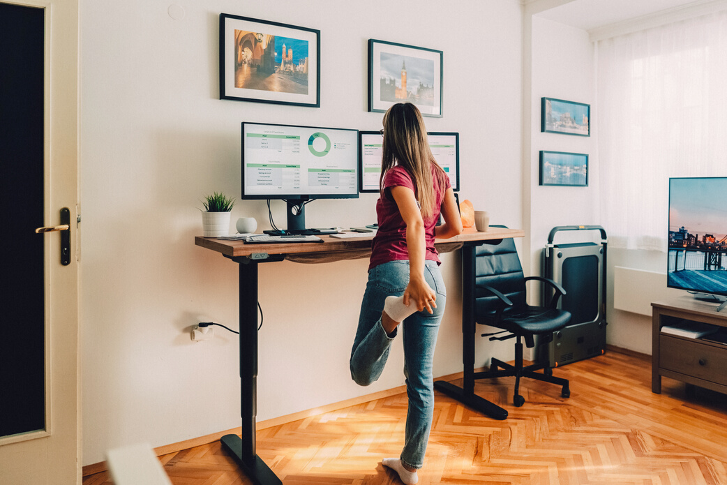 Young woman working at standing desk
